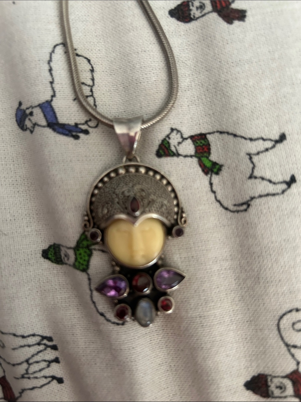 Balinese prince pendant with heavy silver snake chain.